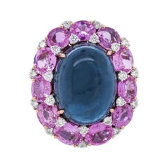 18kt White Gold Ring with 25.30 Cts Sapphires and 1.14 Cts Diamonds
