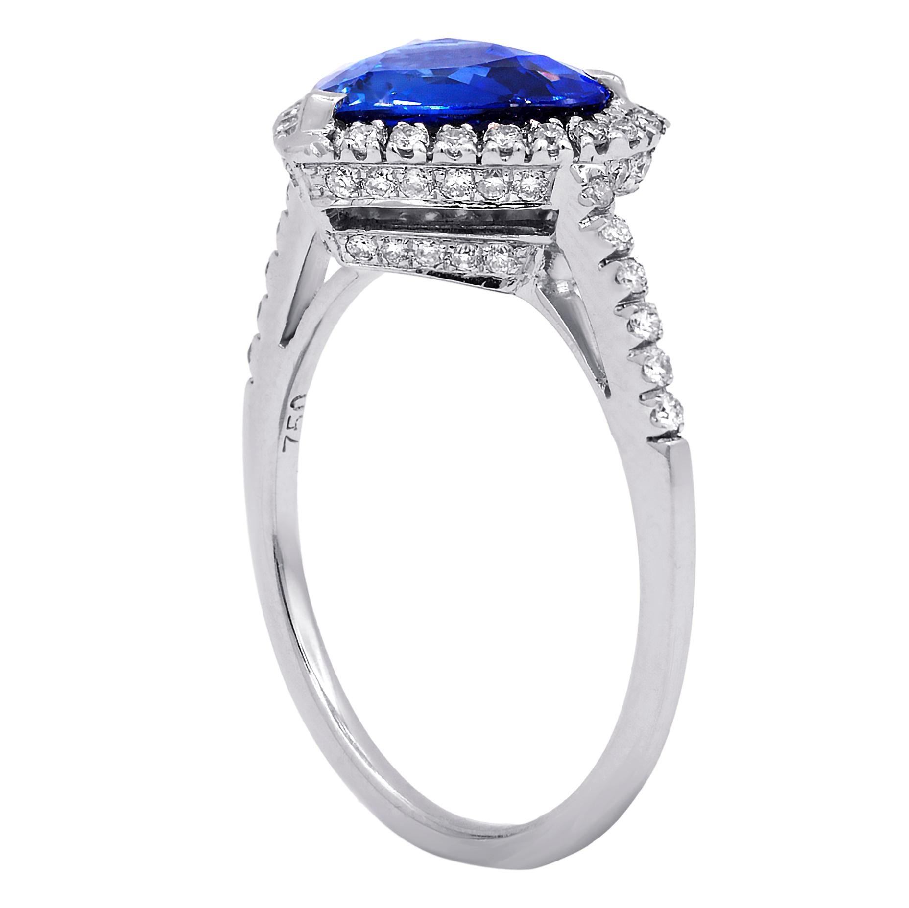 18kt white gold gia certified sapphire and diamond ring, the center stone is 3.00 carats heart shaped sapphire with 0.70 carats of diamonds in halo around the center stone. 
