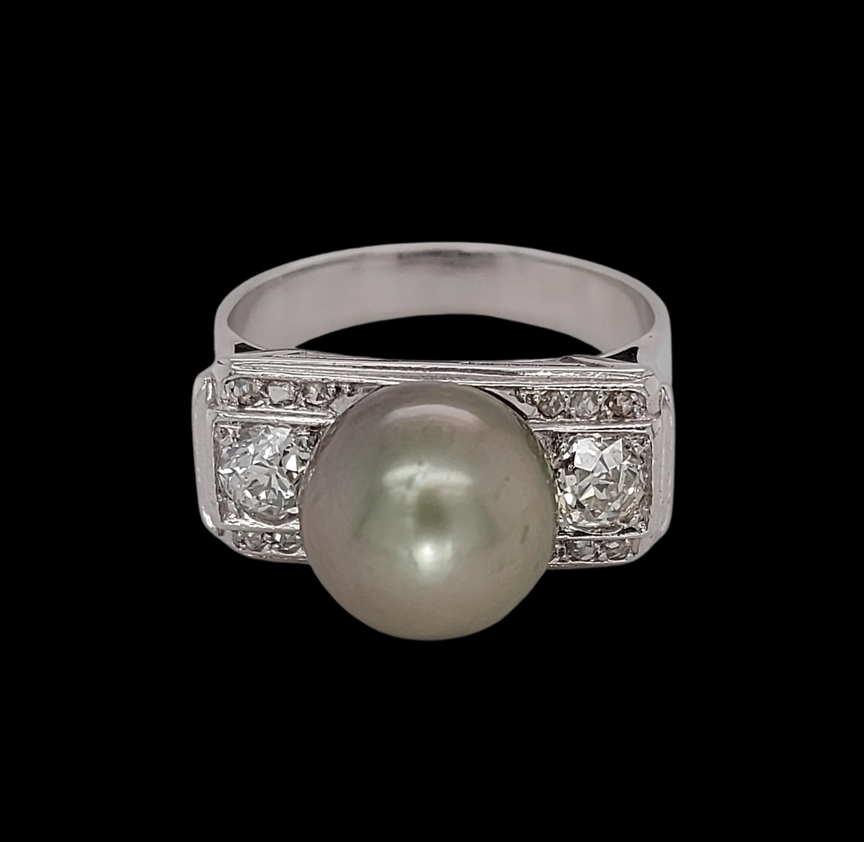 Gorgeous 18kt White Gold Ring With Green Tahiti Pearl and 0.5ct Old Mine Cut Diamonds

Diamonds: Old Mine cut diamonds & Rose Cut Diamonds , together approx. 0.50ct

Pearl: Green pearl ca. 10 mm

Material: 18kt white gold

Ring size: 53.8 EU / 6.75