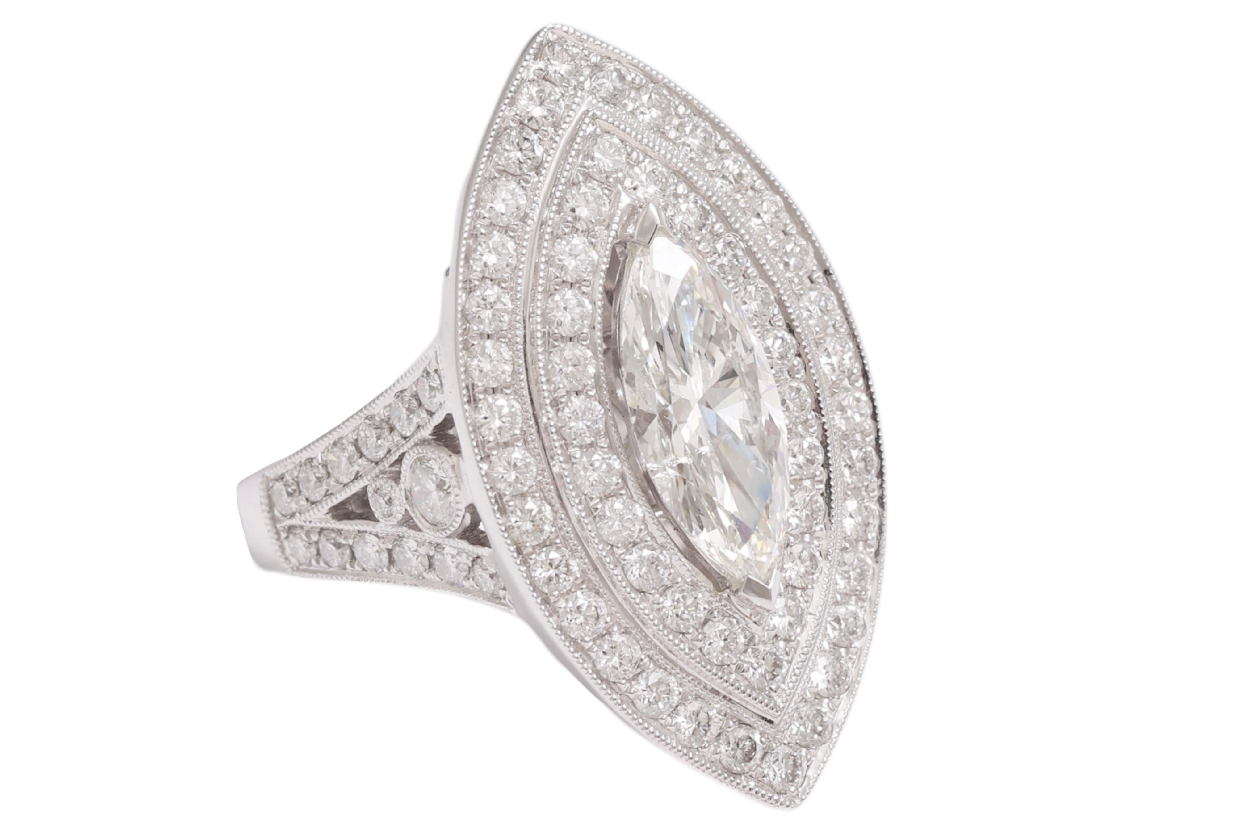 Beautiful & Luxurious 18kt White Gold Ring With Large 1.78 Carat Marquise Diamond & 1.83 Brilliant Cut Diamonds

Diamonds: Small brilliant cut diamonds (together 1.83 Ct) and large marquise diamond 1.78 Ct

Material: 18kt white gold

Ring size: 53.8