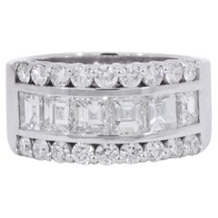 18kt White Gold Ring with Square Emerald Cut and Brilliant Cut Diamonds