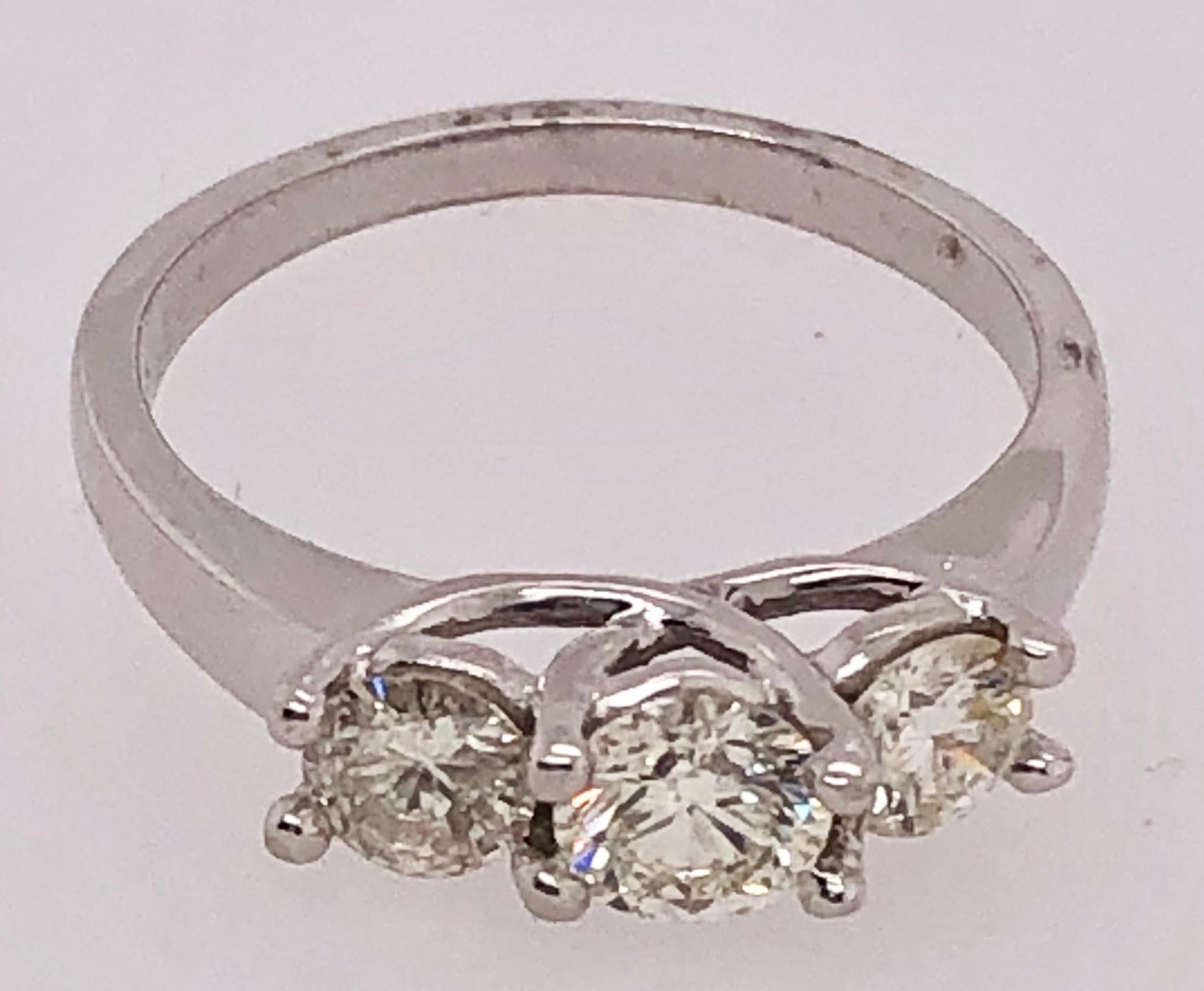 Round Cut 18 Karat White Gold Ring with Three Round Diamonds Totaling 1 Carat For Sale