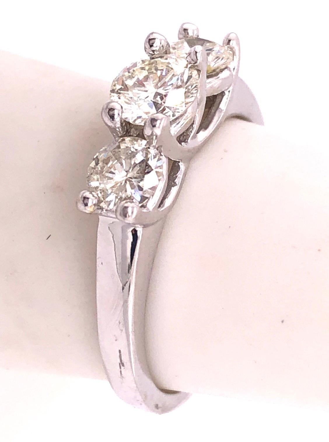 18 Karat White Gold Ring with Three Round Diamonds Totaling 1 Carat For Sale 1