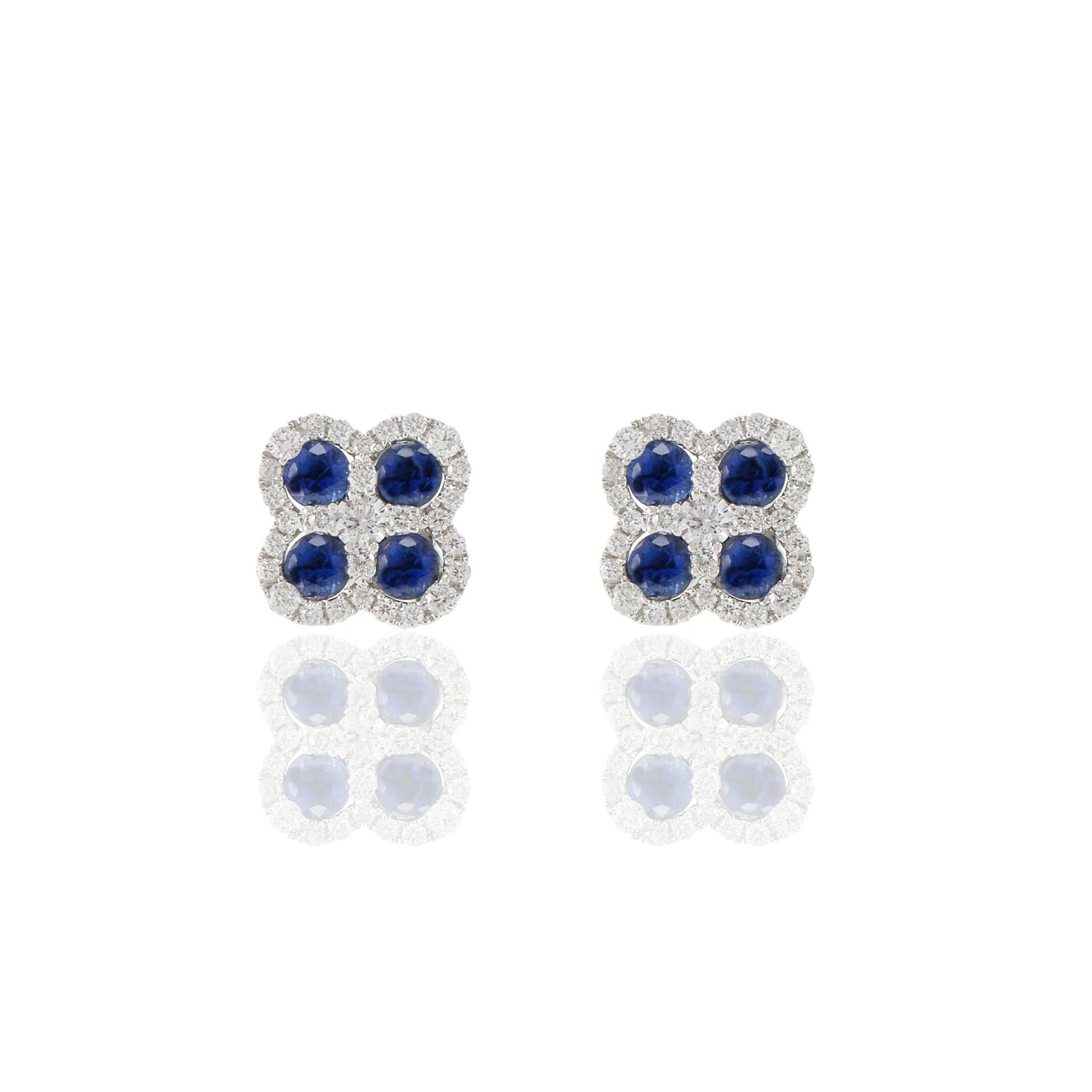 These exquisite clover earrings are crafted from 18KT white gold, boasting an impressive 0.82CT-TW of round cut blue sapphires and 0.38CT-TW G color VS1-VS2 Clarity of dazzling round cut diamonds.
