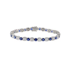 18KT White Gold Round Cut Sapphire And Cluster Diamond Bracelet