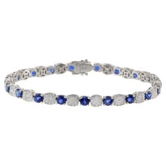 18KT White Gold Round Cut Sapphire And Cluster Diamond Bracelet