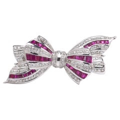 18KT White Gold Ruby 
Diamond Bow Brooch