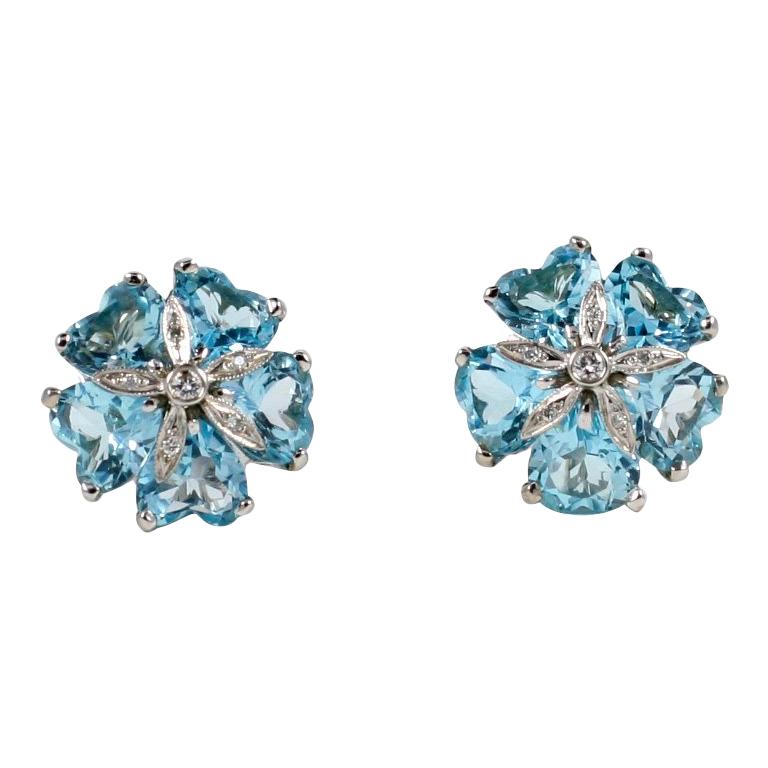 Boucles d'oreilles dollar en or blanc 18 carats avec topaze bleue et diamants