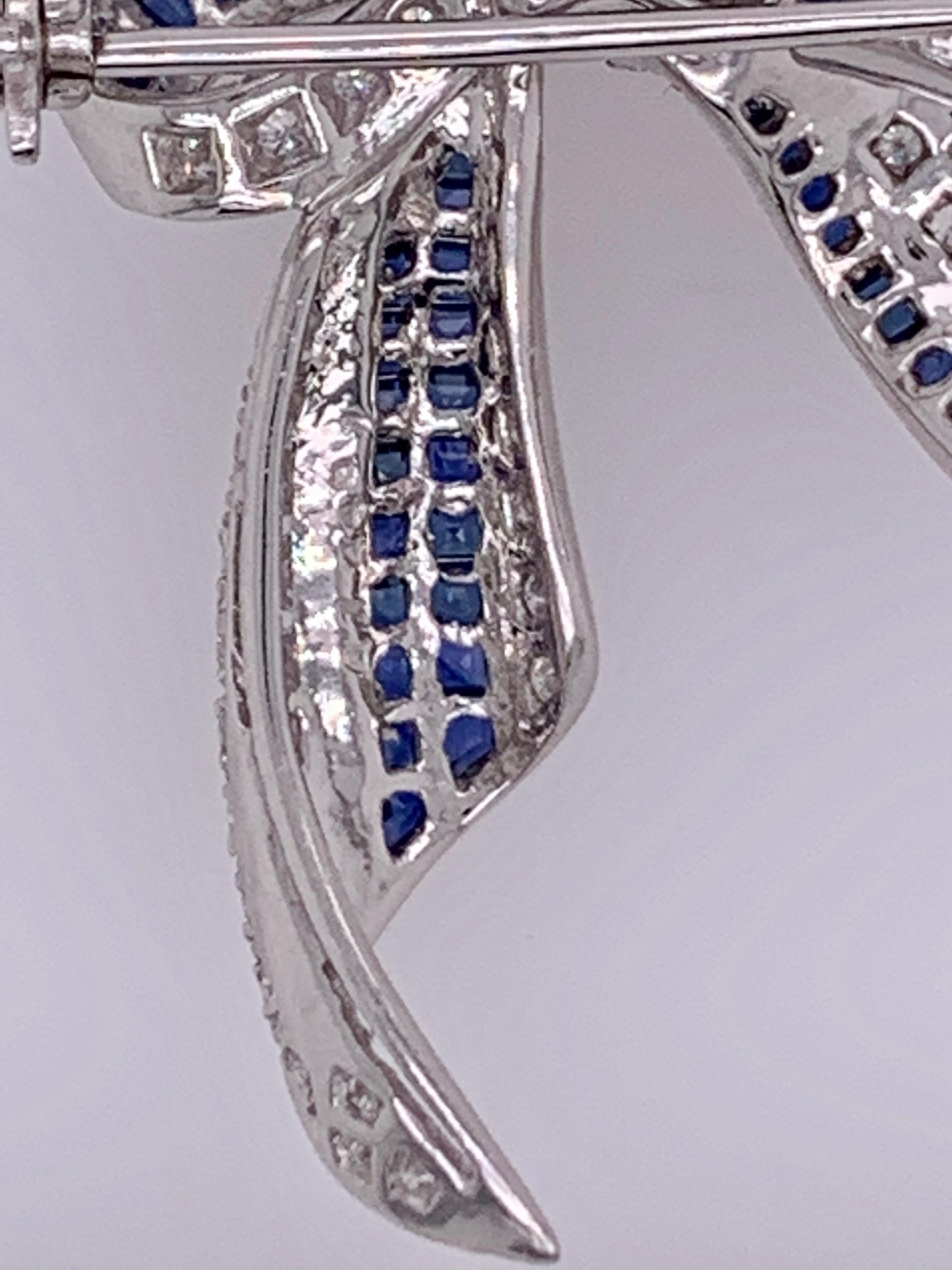 18 Karat White Gold Sapphire and Diamond Bow Pin 1.10 TDW For Sale 1