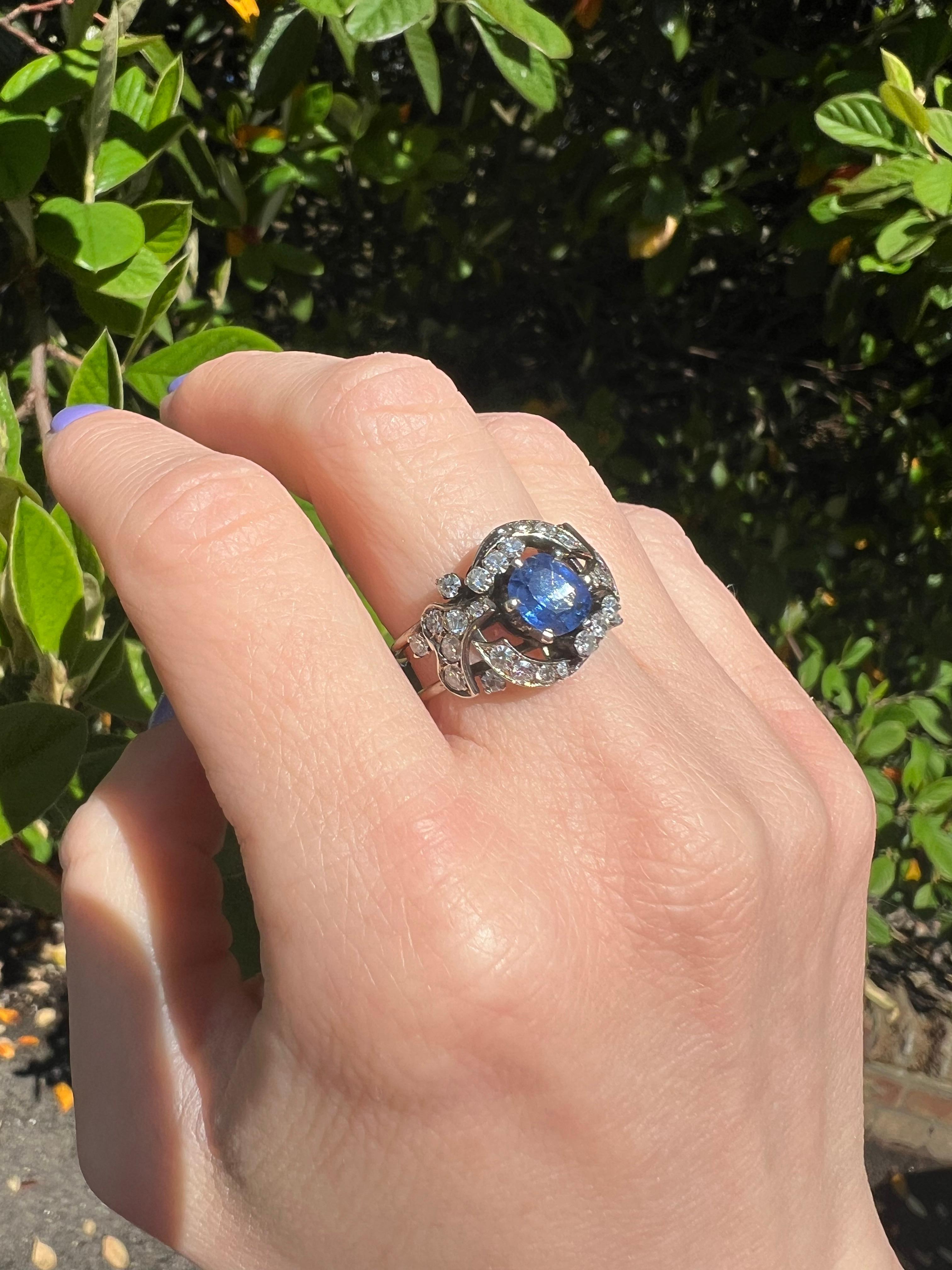 18kt white gold Sapphire and Diamond cluster.
The ring shank is adjustable.

Dimensions -
Ring Size (UK) = L (EU) = 53 (US) = 6
Weight: 5.00 grams

Sapphire -
Quantity of stones: 1
Cut: Oval faceted
Approx. Main stone carat weight: 0.80