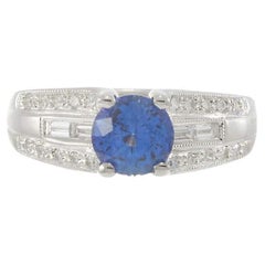 Anello con zaffiro e diamante in oro bianco 18KT