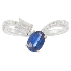 Anello a fascia con zaffiro e diamante in oro bianco 18KT