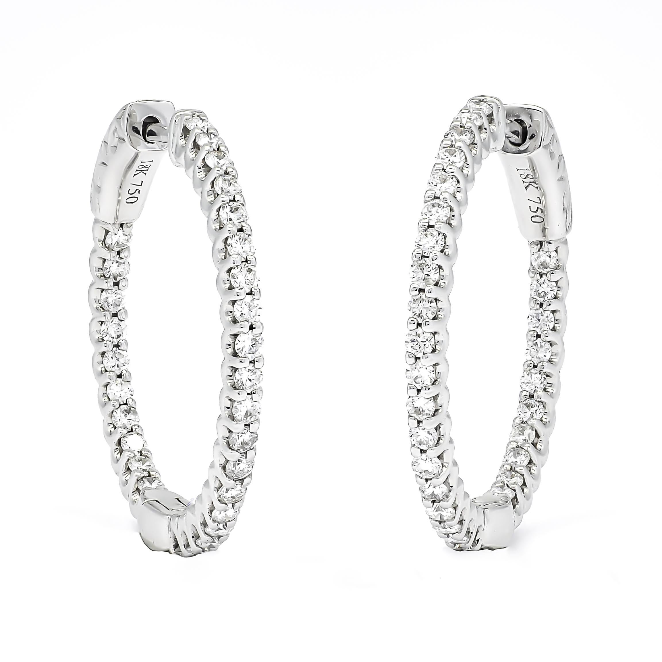 Ti presentiamo i nostri squisiti cerchi con diamanti naturali in oro bianco 18KT, una vera incarnazione di eleganza e lusso. Questi orecchini a cerchio con diamante a fila singola sono realizzati con cura per elevare il tuo stile e lasciare