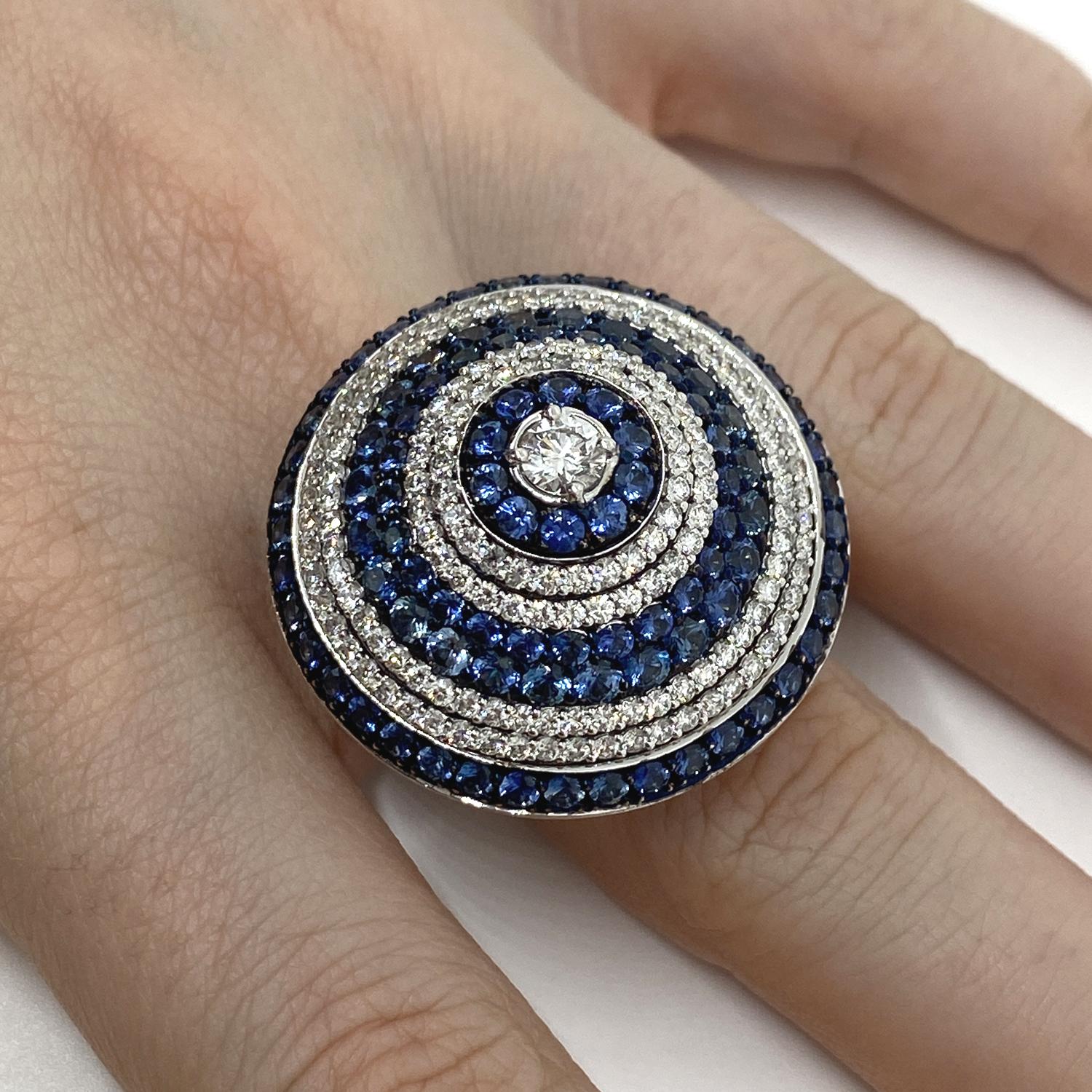 Spiral ring made of 18kt white gold with brilliant-cut natural diamonds for ct.2.15 and brilliant-cut blue sapphires for ct.4.50 G VVS

Welcome to our jewelry collection, where every piece tells a story of timeless elegance and unparalleled