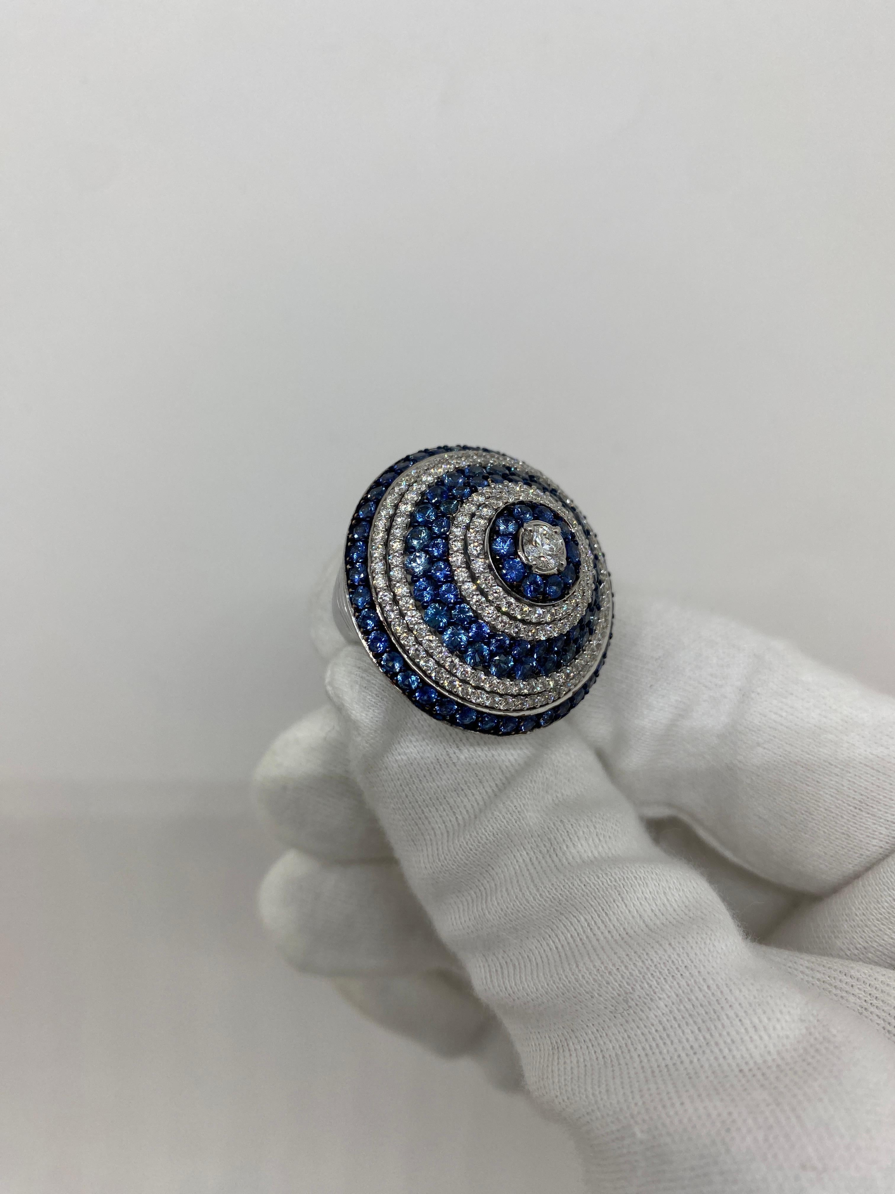 Women's 18Kt White Gold Spiral Ring Blue Sapphires 4.50 ct White Diamonds 2.15 ct G VVS For Sale