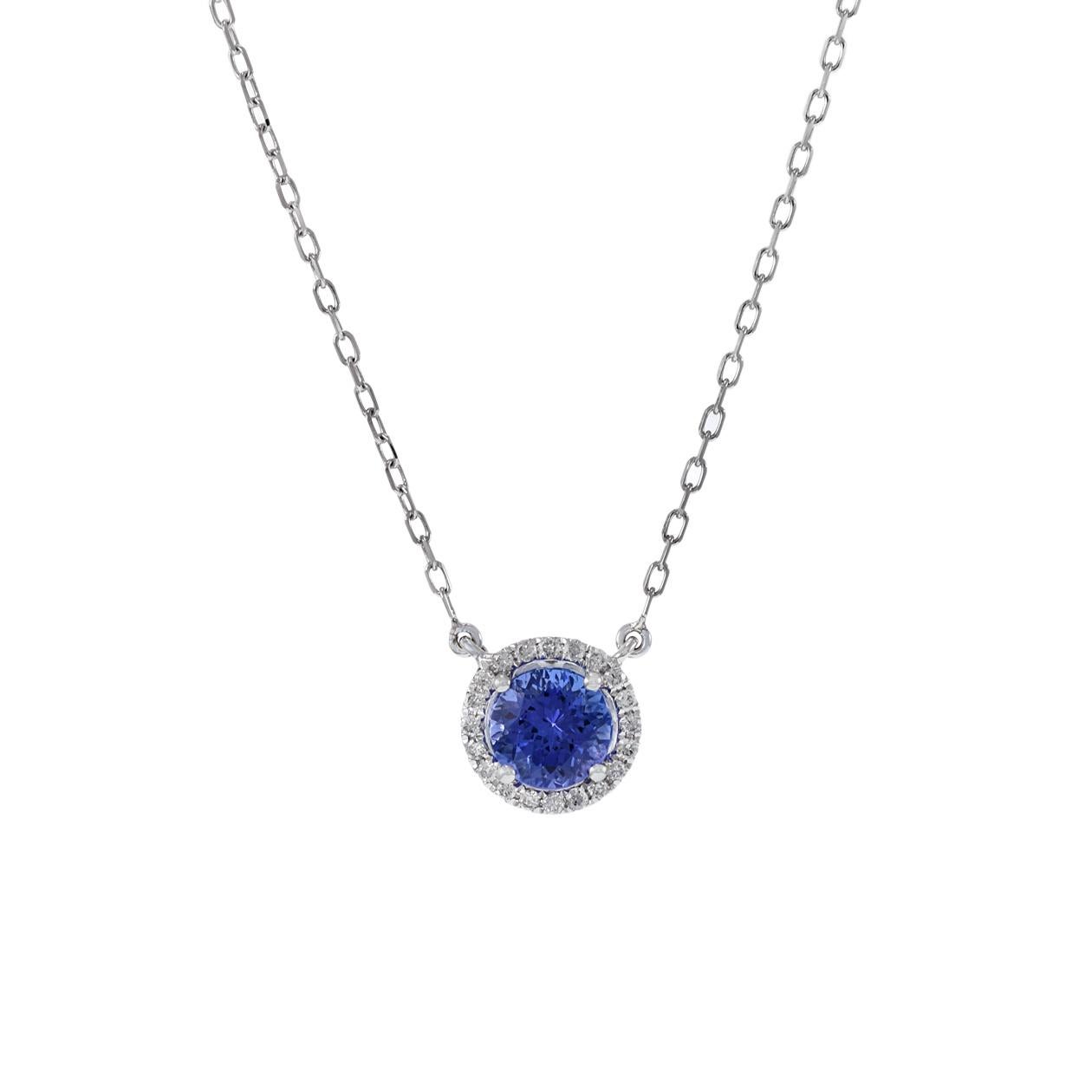 This 18KT white gold necklace is a lovely piece of jewelry, featuring a single round-cut genuine tanzanite with a weight of 0.88 carats. The tanzanite is elegantly surrounded by a halo of round-cut diamonds, with a combined weight of 0.10 carats.