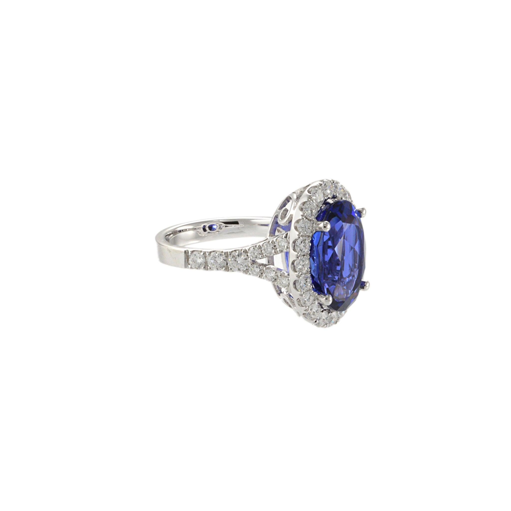 Modern 18KT White Gold Tanzanite and Diamond Ring For Sale