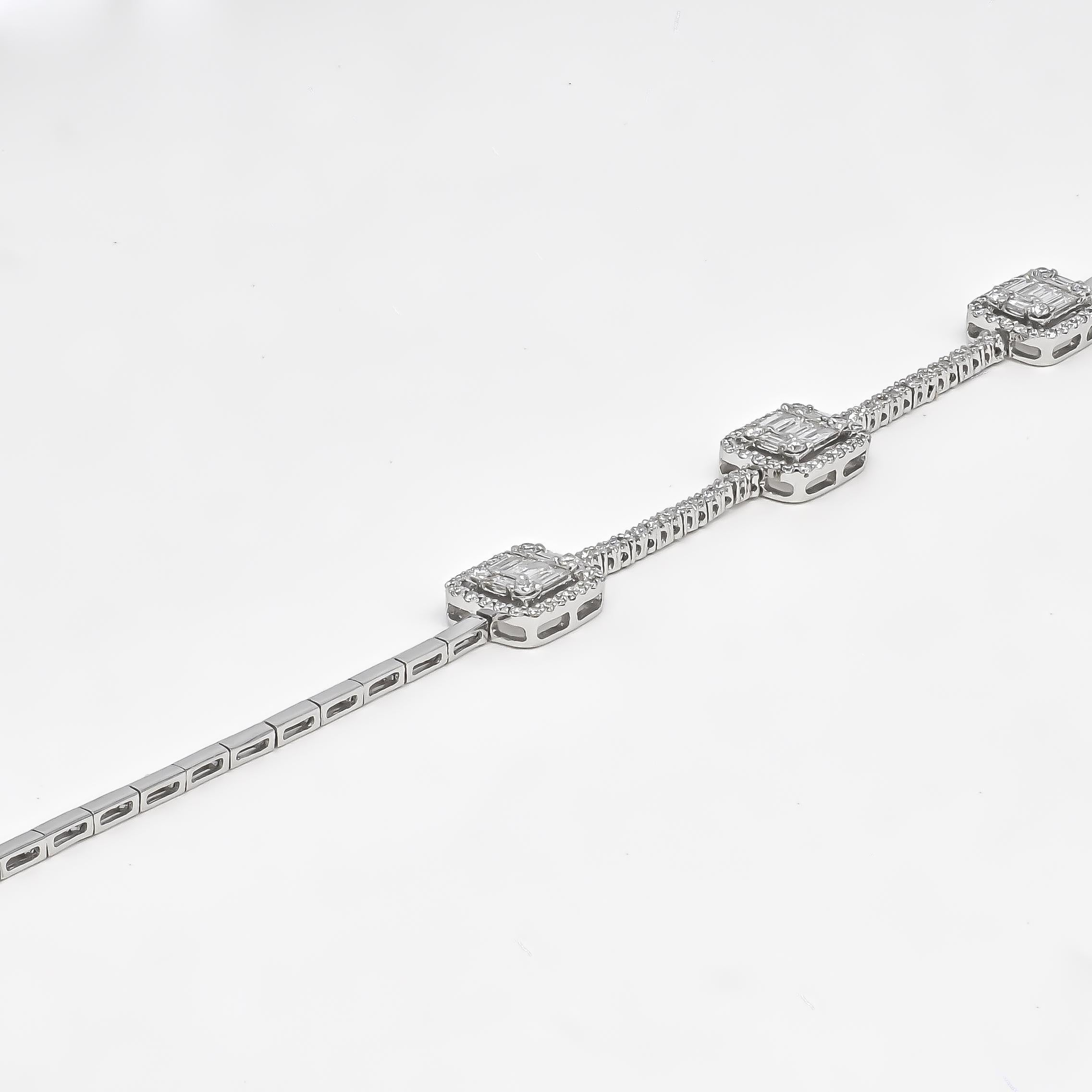 This 18KT white gold diamond tennis bracelet is a true representation of happiness and joy. The sparkling trio of baguette diamonds set in an illusion design is a showstopper and will make you feel radiant every time you wear it. The 18kt white gold