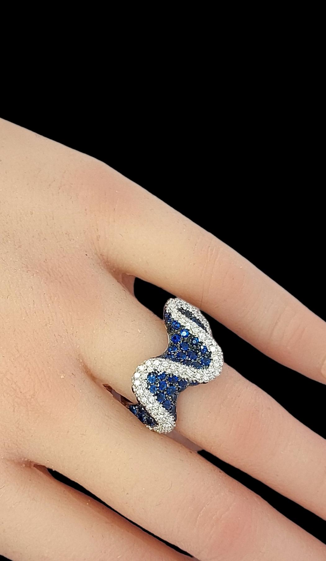 18kt White Gold Wavy Ring with 2.6ct Diamonds & 2.8ct Blue Sapphires For Sale 11