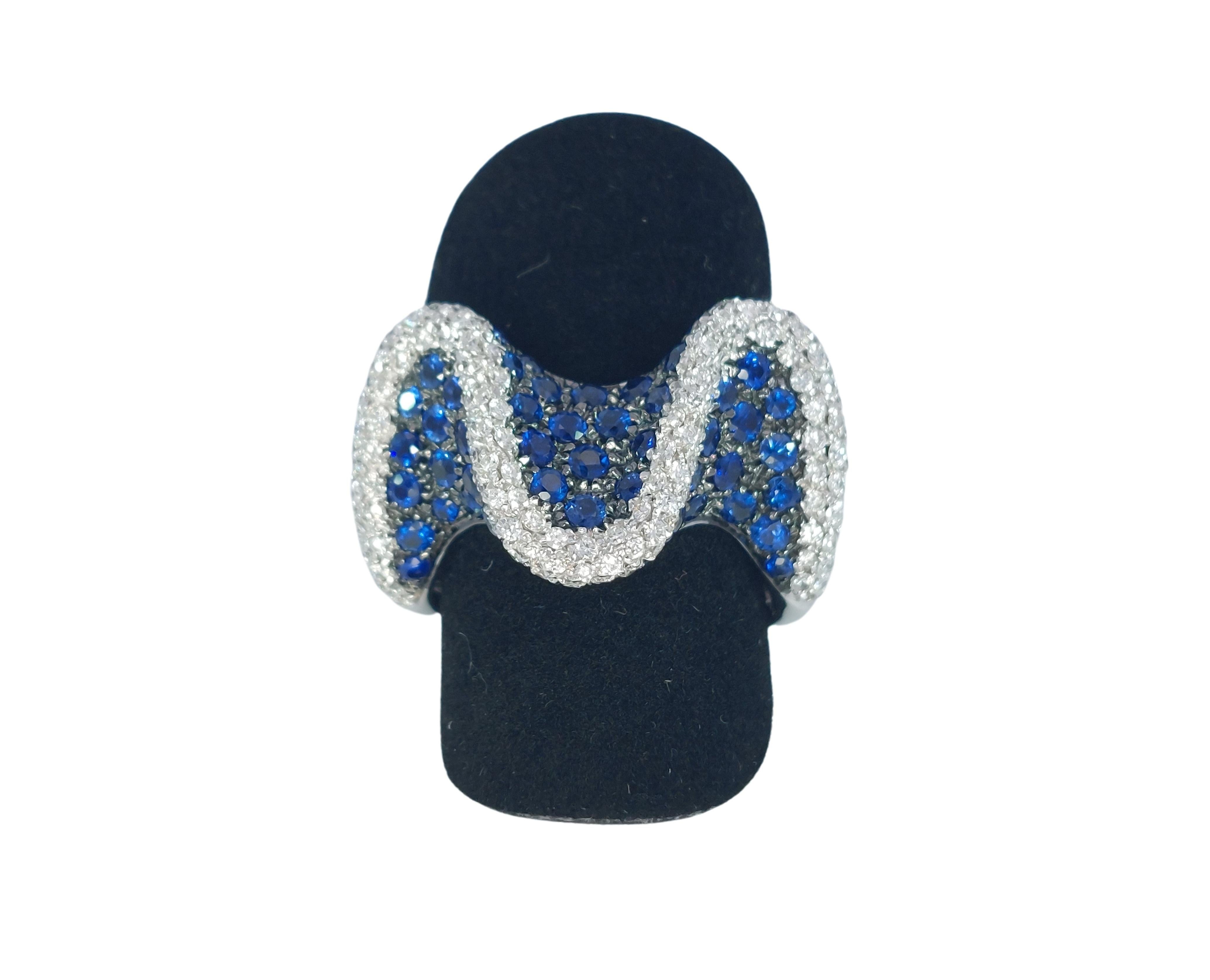 Artisan 18kt White Gold Wavy Ring with 2.6ct Diamonds & 2.8ct Blue Sapphires For Sale