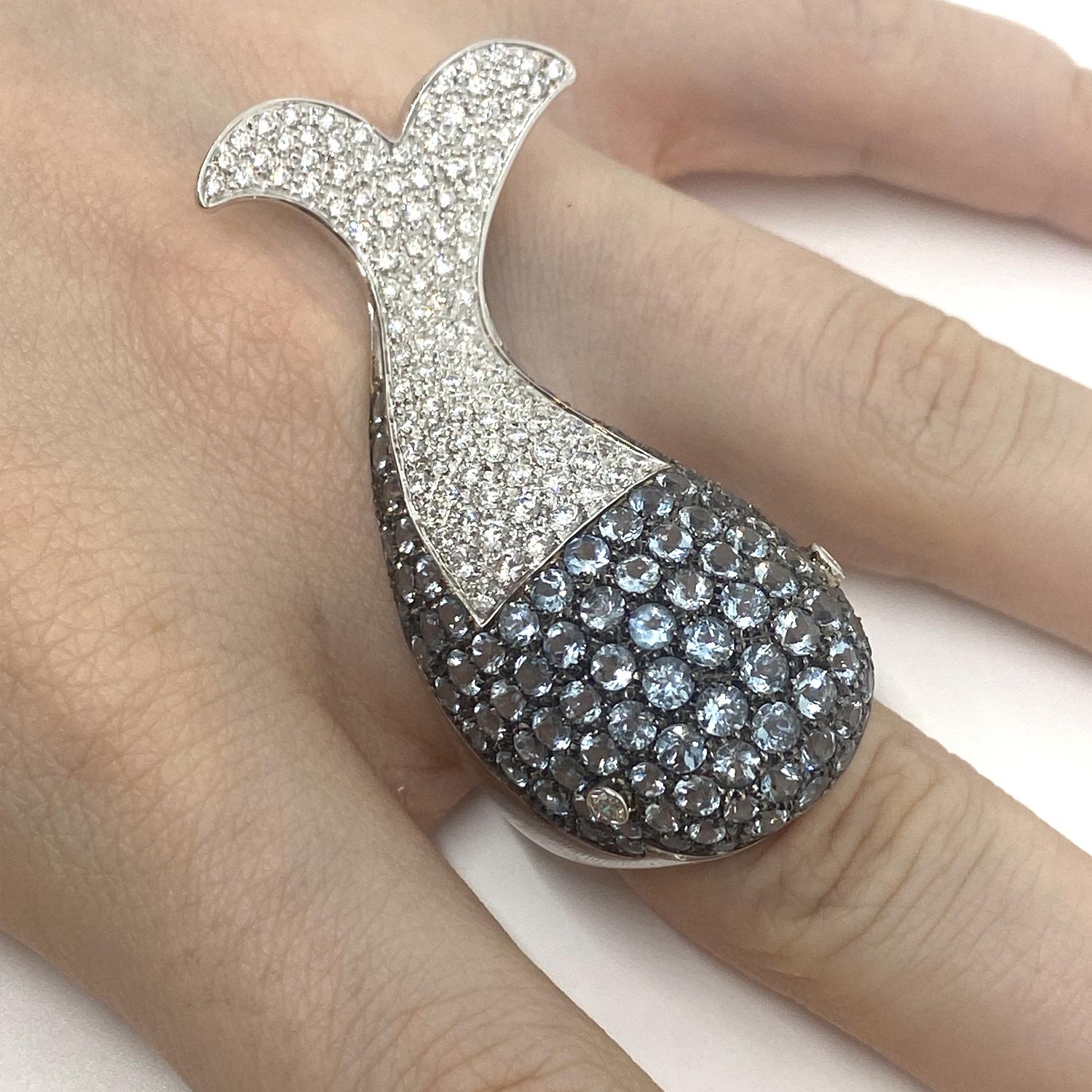 Whale Ring made of 18kt white gold with natural brilliant-cut diamonds for ct.1.71 and natural brilliant-cut aquamarine for ct.7.10

Welcome to our jewelry collection, where every piece tells a story of timeless elegance and unparalleled