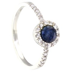 18Kt White Gold Whit White Diamonds and Sapphire Ring