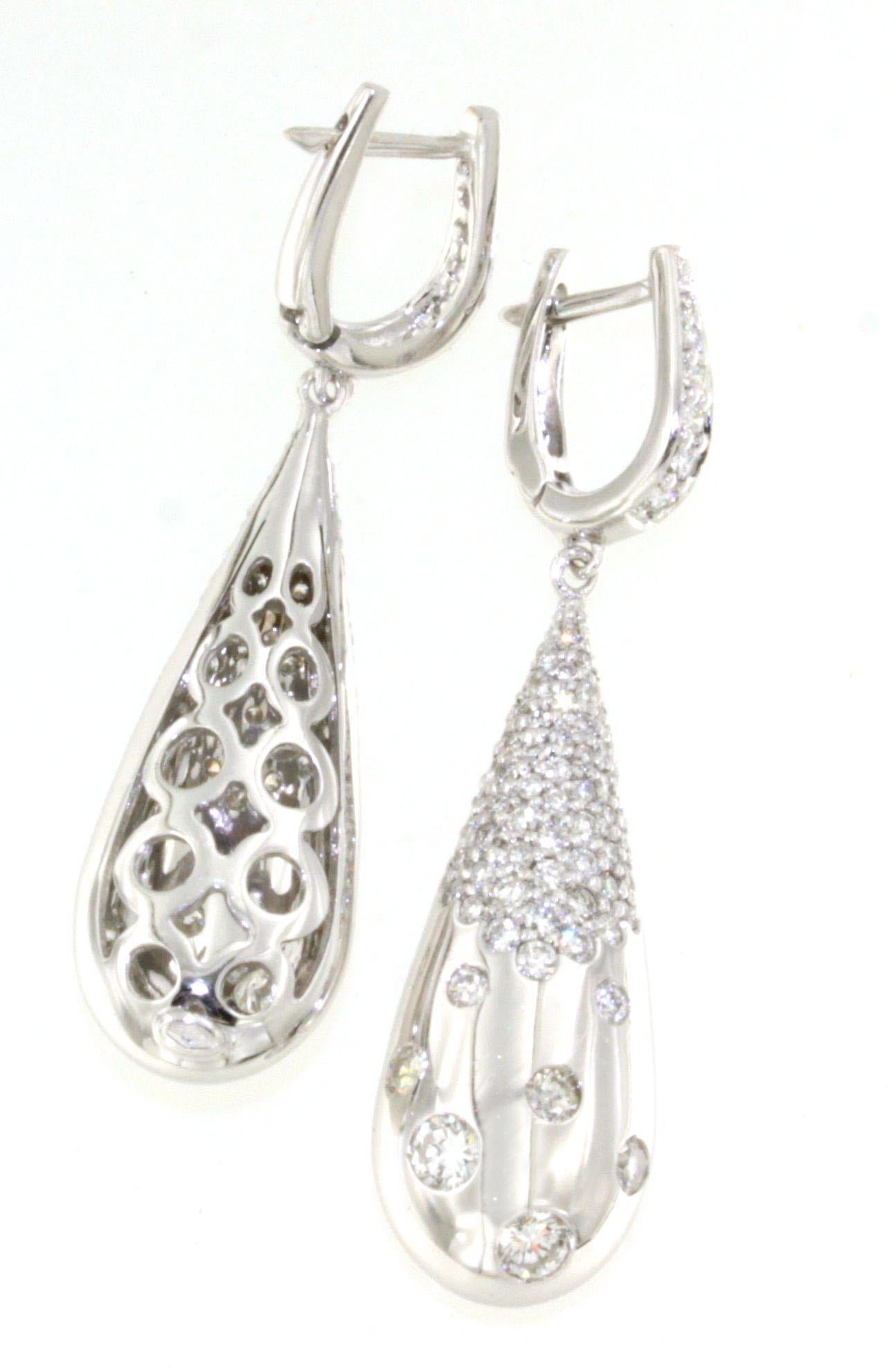 Modern 18Kt  White Gold  White Diamonds  Timeless Dangle Earrings For Sale