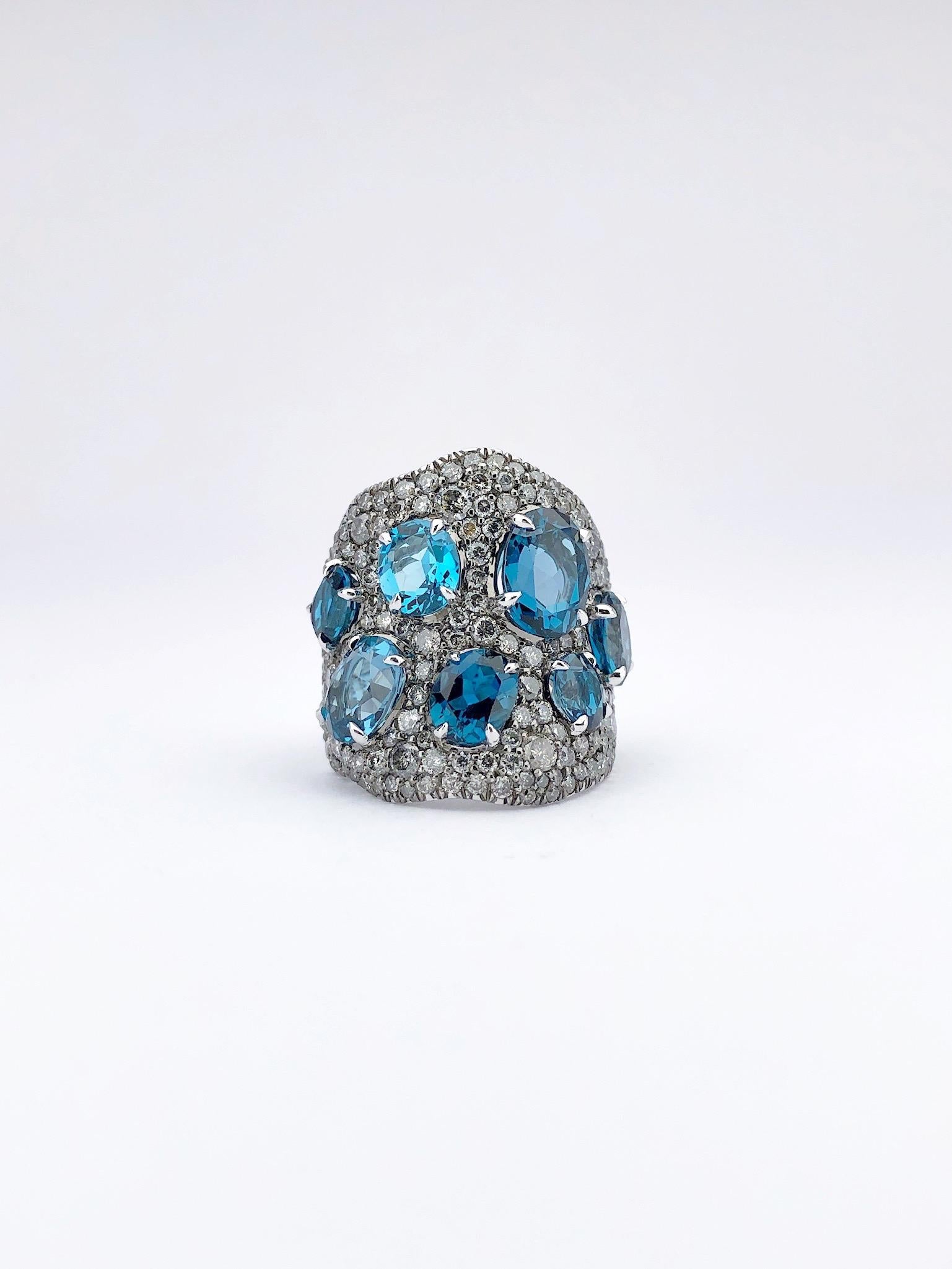 Modern 18 Karat Gold Wide, 3.45ct Silver Grey Diamond & 8.20 Carat Blue Topaz Wave Ring For Sale