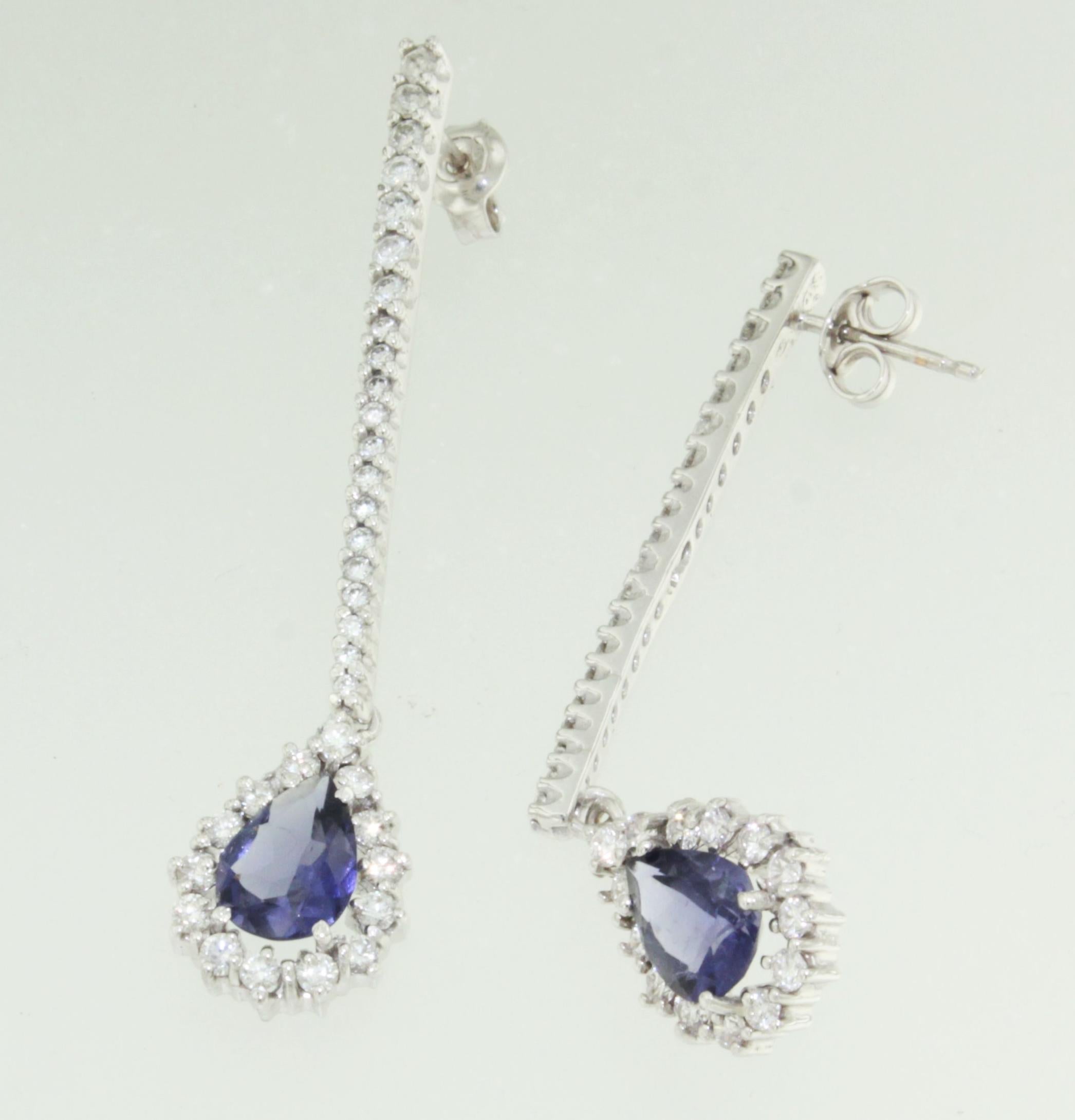Amazing long Earrings in white gold 18kt . Very special design and stones : Iolite cts 2,50 and white Diamonds hight quality total carat 2,60
Unique piece . Design and handmade in Italy by expert jewelers from Stanoppi Jewellery.Earrings with a