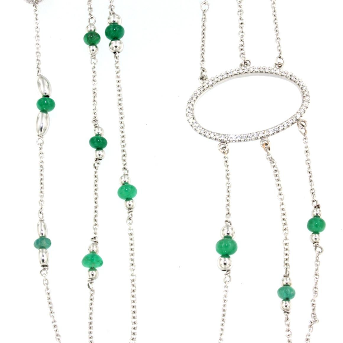Amazing long necklace  , intense green emeralds, very nice and particular design . Made in Italy by Stanoppi Jewellery since 1948.  Necklace composed of 3 chains joined by a large oval of diamonds.

g.54.25  cts 0.68 (0.56+0.12)  cm 92 

  All