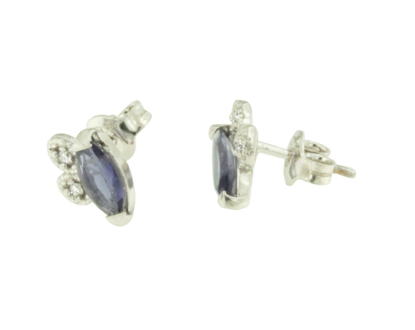Modern, elegant earrings in white gold 18kt . Iolite stones with an intense and bright blue color, they can be worn for any occasion or for special days. Hande made in Italy by Stanoppi Jewellery since 1948. White diamonds cts 0.04


All Stanoppi
