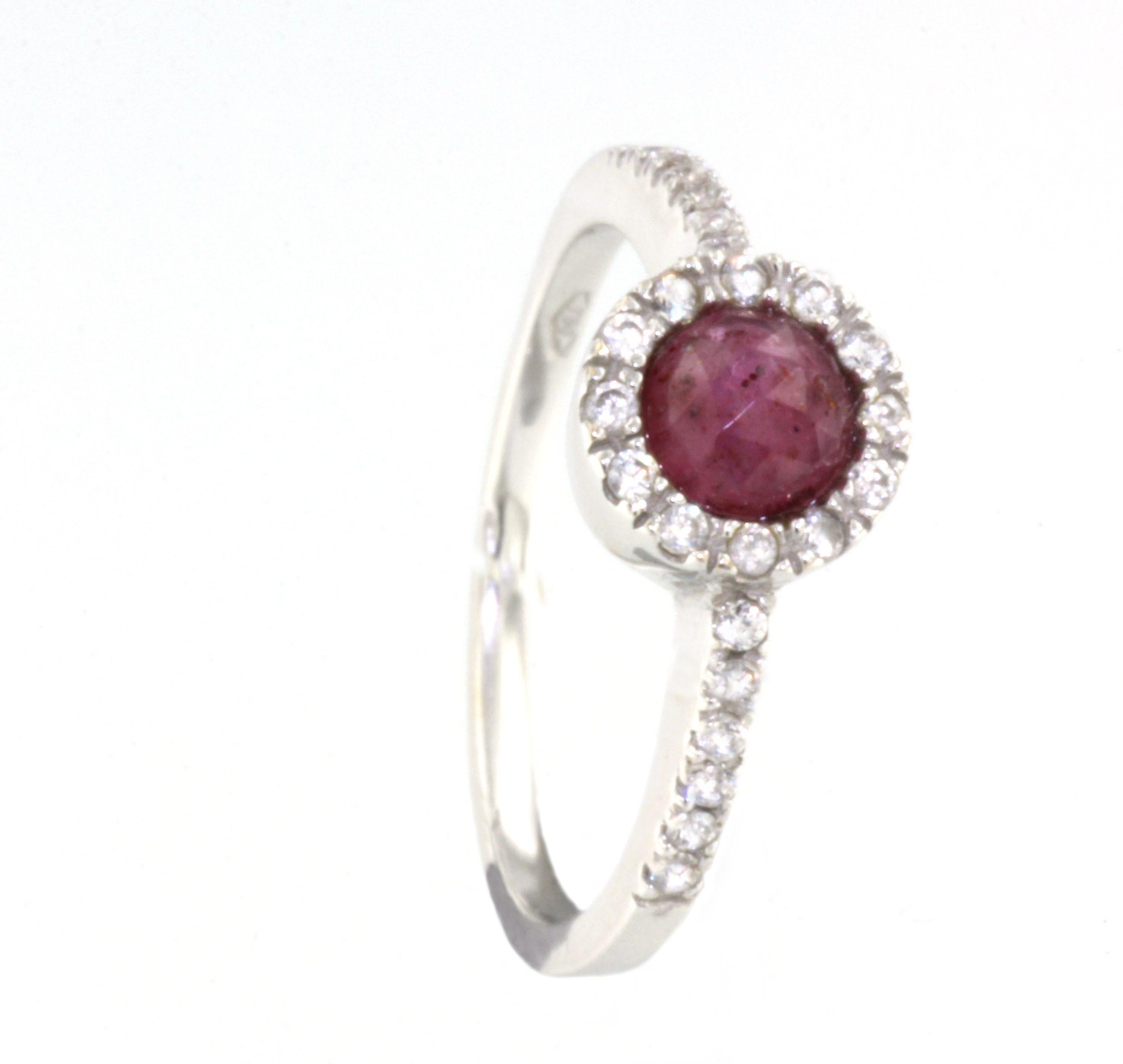 modern, classic, suitable for any occasion.    Pretty ring in 18kt gold with White Diamonds Cts 0,25  Stone : Pink Ruby round cut mm 5,00

Ring size : 14 - 54   USA 7  g.4,00


All Stanoppi Jewelry is new and has never been previously owned or worn.