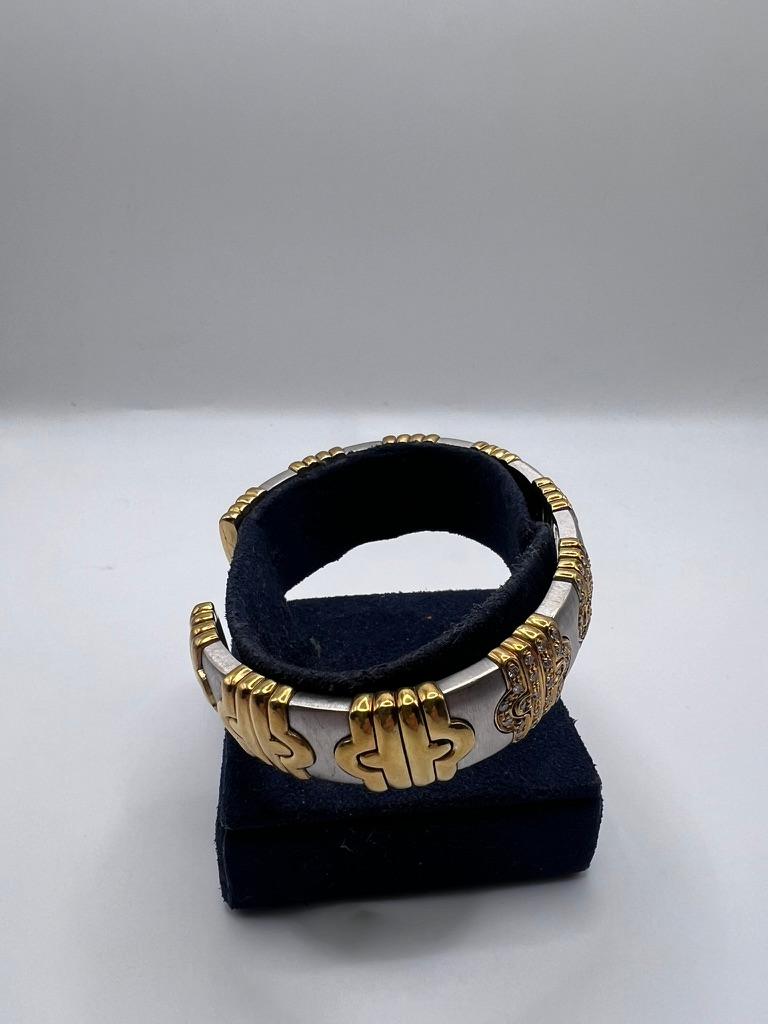 18kt white gold, yellow gold, and diamond bangle bracelet In Excellent Condition For Sale In New York, NY
