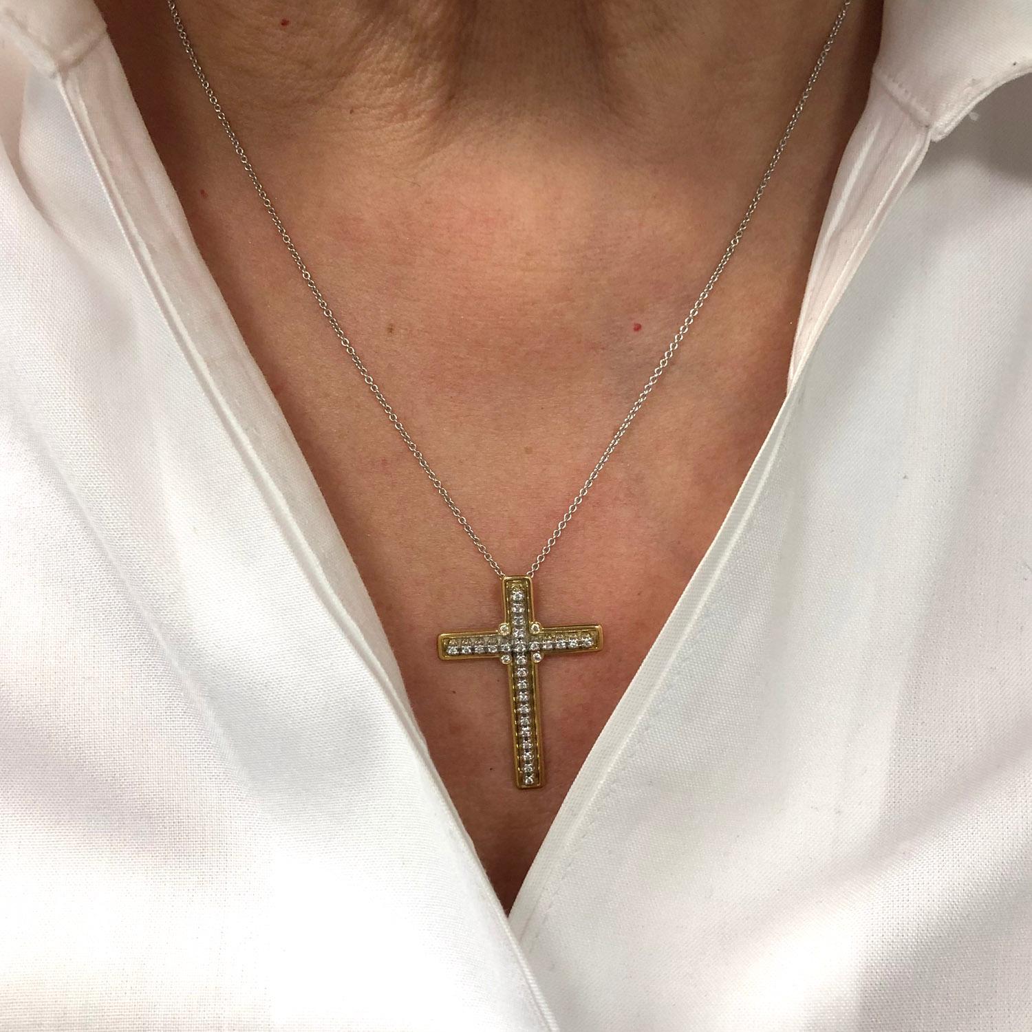 18Kt White* & Yellow gold diamond cross pendant on an 18 Kt gold chain. 

30 Round brilliant cut diamonds total weight:  0.22 ct clarity VS, color F-G

MADE IN MONTREAL BY JOAILLERIE ST-ONGE
Each piece is inspired by the past but adapted to today’s
