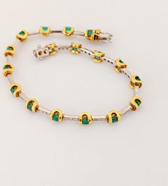 Oro bianco e giallo 18KT, 2,04Ct. Smeraldo e .51Ct. Bracciale tennis con diamanti