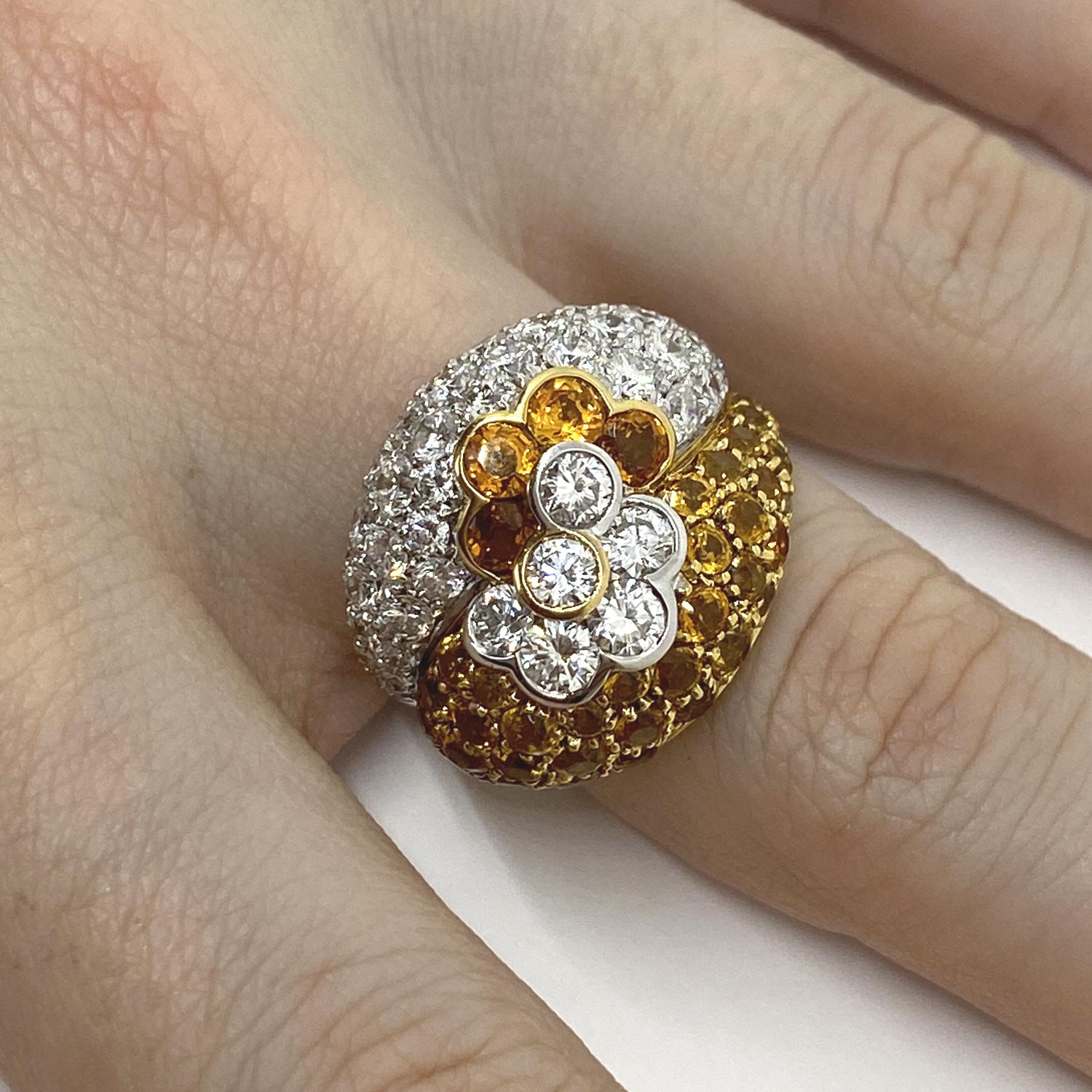 Band ring made of 18kt white and yellow gold with white brilliant-cut natural diamonds for ct.0.79 and yellow brilliant-cut natural sapphires for ct.4.10

Welcome to our jewelry collection, where every piece tells a story of timeless elegance and