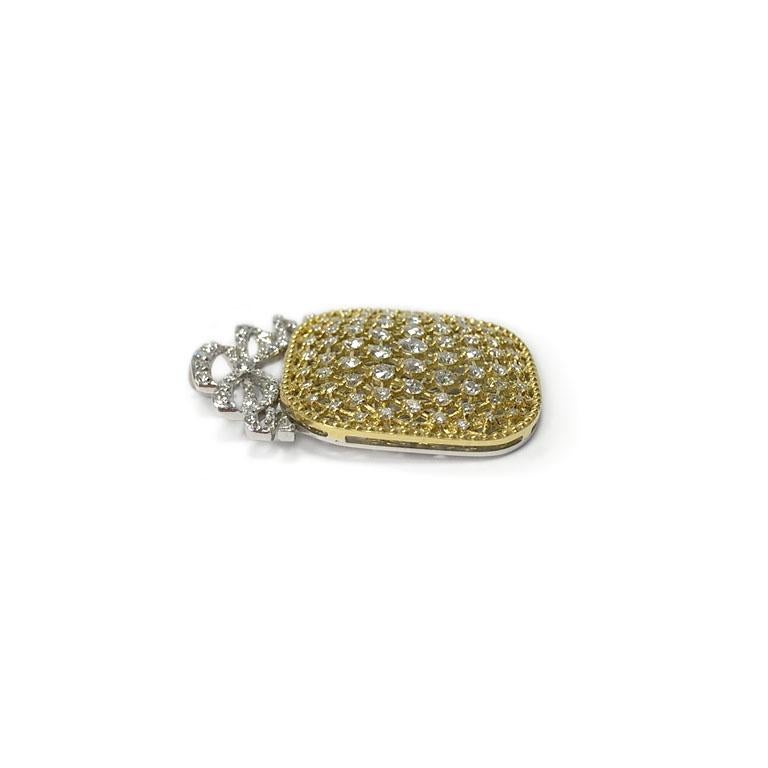 18Kt Yellow Gold Victorian Cushion Chain Pendant with white diamonds. Bow and Backing are made in 18Kt white* gold. 

121 Round brilliant cut diamonds total weight:  1.60ct

Made in Montreal by Joaillerie St-Onge

Lenght: 1.32 in
Width:  0.94