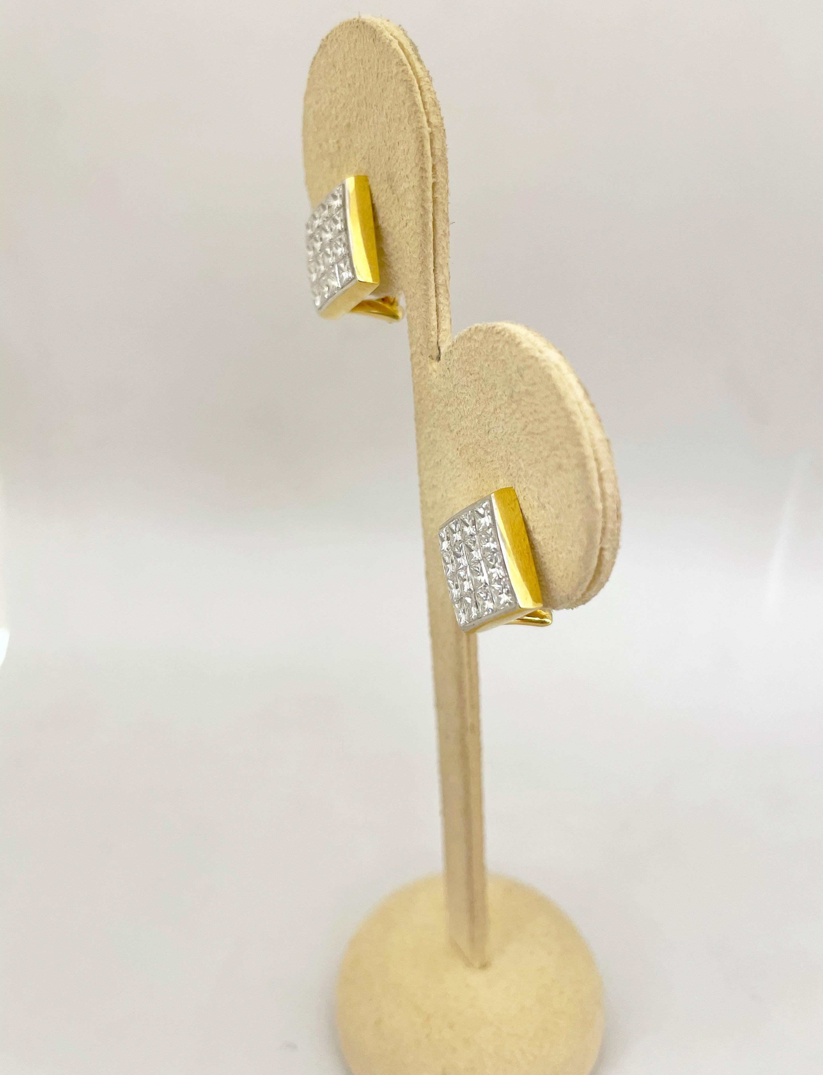 Contemporary 18KT Yellow and White Gold, 2.95Ct. Invisibly Set Princess Cut Diamond Earrings For Sale
