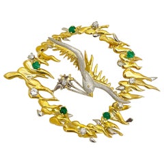 Broche de pájaro de oro amarillo y blanco de 18 quilates con 1,20 ct. Esmeralda y 0,75Ct. Diamante