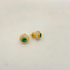 18 Karat Yellow Gold 1.37 Carat Diamond and .98 Carat Emerald Stud Earrings
