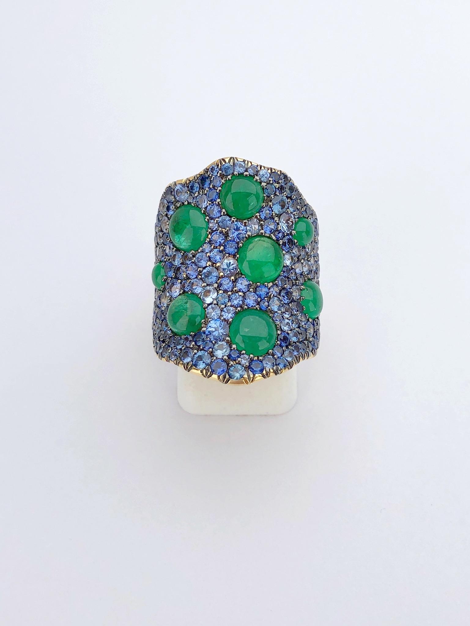 Women's or Men's 18 Karat Gold 2.99 Carat Cabochon Emerald and 3.81 Carat Blue Sapphire Wave Ring For Sale