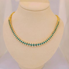 18 Karat Gold 3.68 Carat Emerald and 4.31 Carat Diamond Necklace and Bracelet