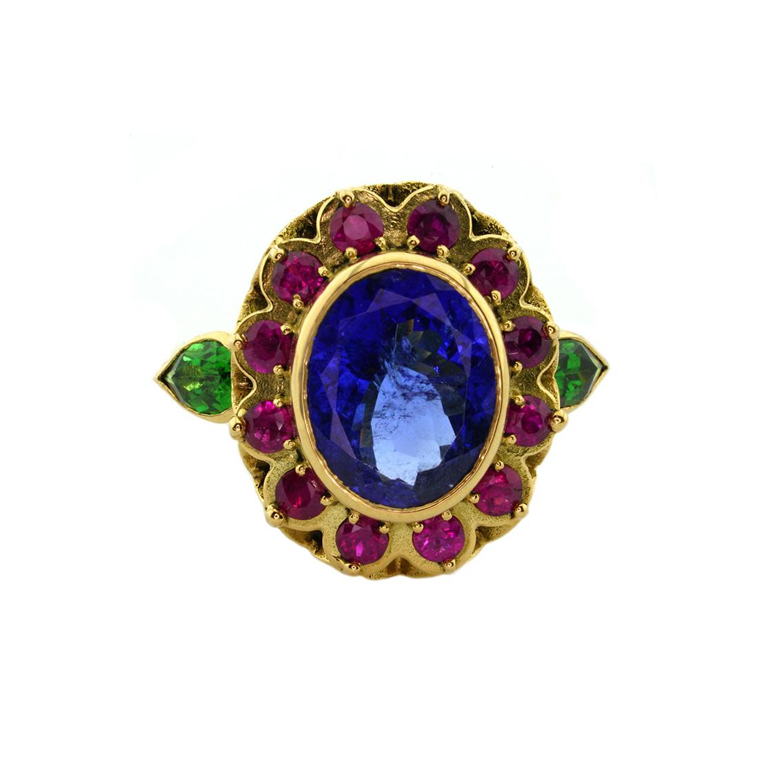 18kt Yellow Gold, 6.00ct Tanzanite, 0.75ct Ruby and 0.50ct Tsavorite Garnet Ring In New Condition In Melbourne, Vic
