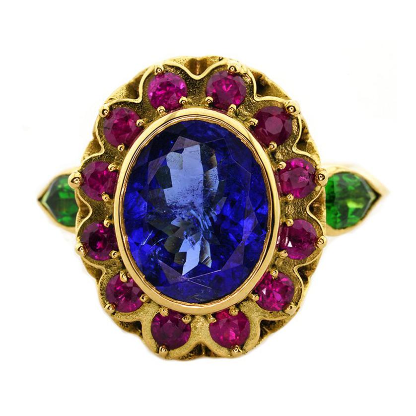 18kt Yellow Gold, 6.00ct Tanzanite, 0.75ct Ruby and 0.50ct Tsavorite Garnet Ring