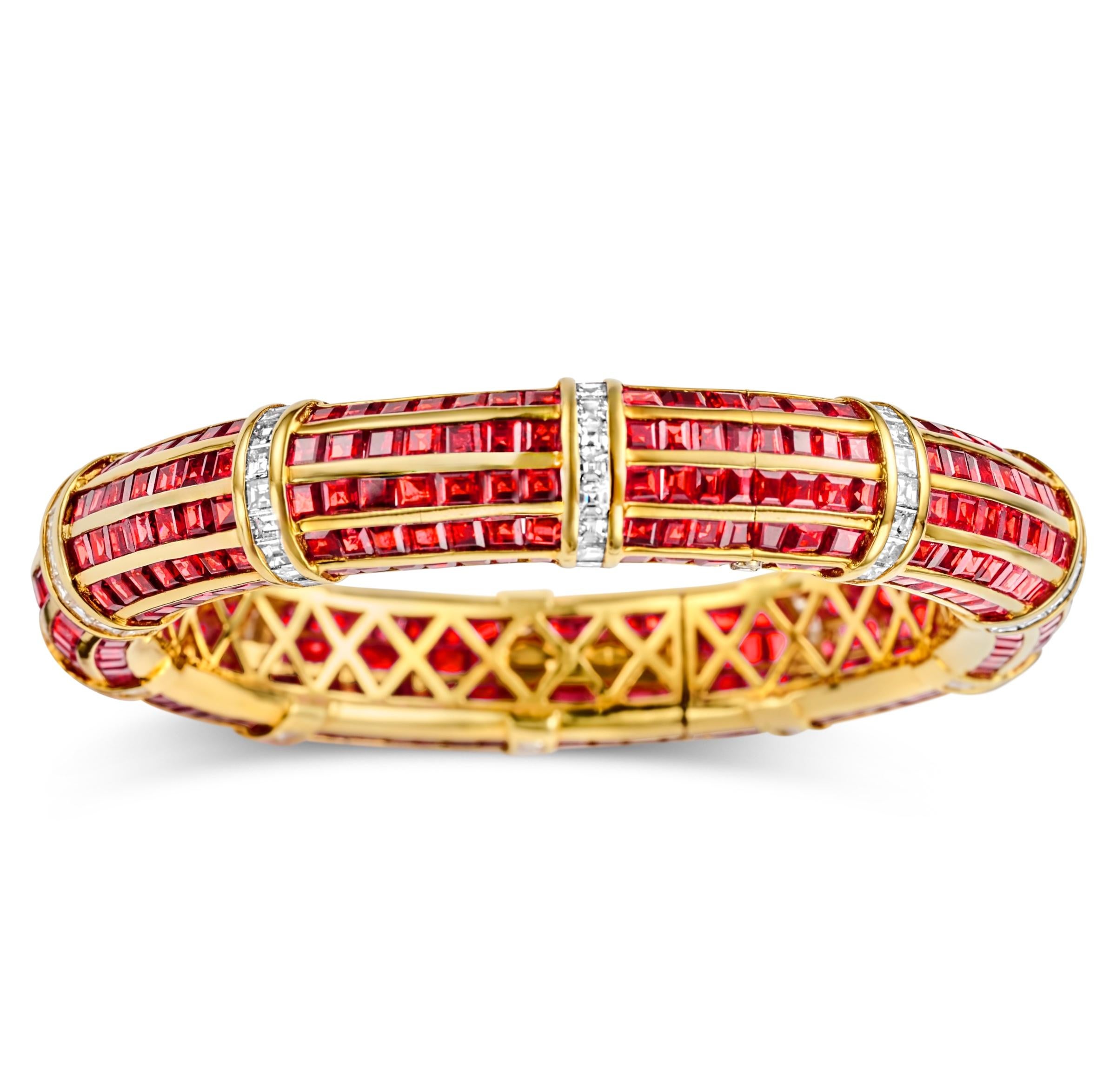 Magnificent 18kt Yellow Gold  Bangle Bracelet with Red Rubies and 5ct Square Emerald Cut Diamonds from Estate His Majesty The Sultan Of Oman Qaboos Bin Said

Rubies: 420 rubies : Ca. 30 Ct

Diamonds: Square cut diamonds, together in total approx. 5
