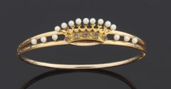 Bracelet couronne en or jaune 18kt avec améthyste, péridot et perles