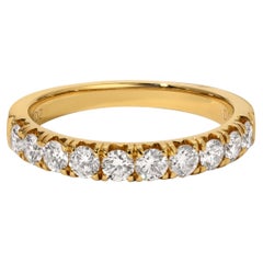 18 Karat Yellow Gold and 0.7 Carat Diamond Half Band Ring