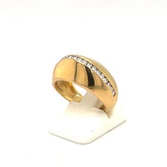 Kuppelring aus 18kt Gelbgold und Diamant 0,63ct