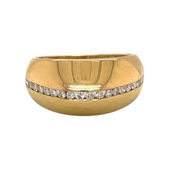 Kuppelring aus 18kt Gelbgold und Diamant 0,63ct