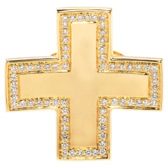Kreuzring aus 18 Karat Gelbgold mit Diamanten